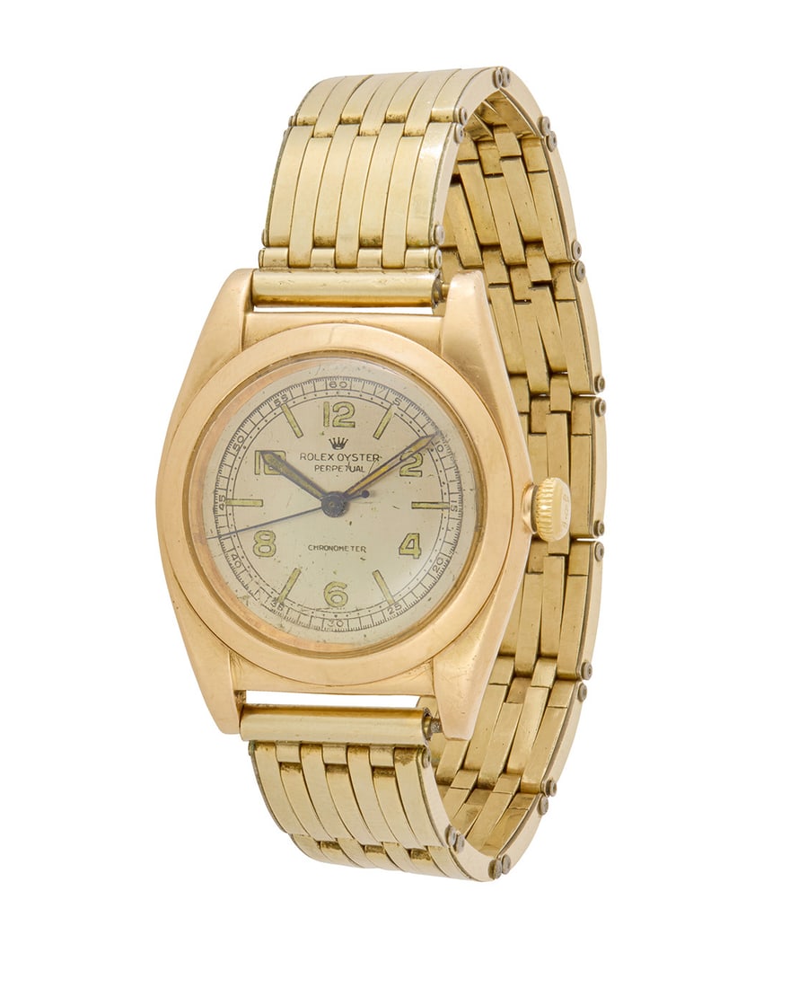 Rolex: A 14K Gold 'Bubble Back' Watch and Gold-Filled Strap (1 of 3)