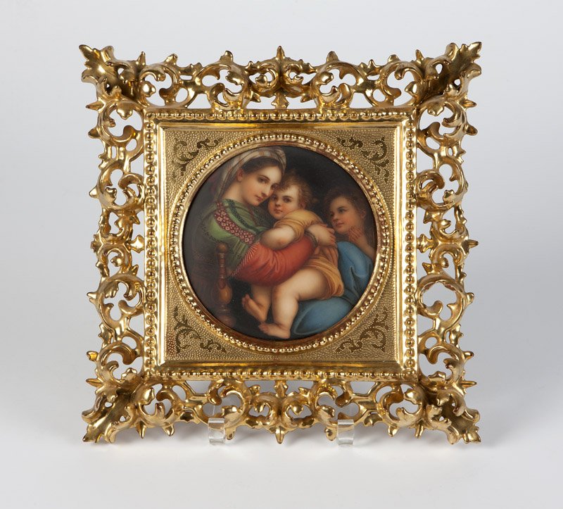 An Italian porcelain plaque Madonna after Raphael: Early 20th century, Florence, Italy, printed red mark ''Firenze'' beneath a fleur-de-lys, impressed ''150'' and inscribed ''150 R/ 1287'', with paper label of Florentine frame maker ''A. Signorini'' a