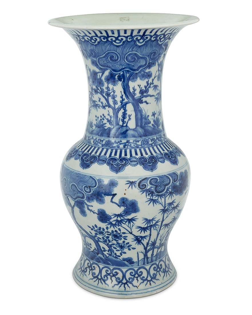 A Chinese blue and white porcelain baluster vase: A Chinese blue and white porcelain baluster vase Kangxi Period (1662-1722) or later Unmarked The neck and body depicting arboreal landscapes within friezes bordered by Ruyi 21" H x 11.25" Dia.