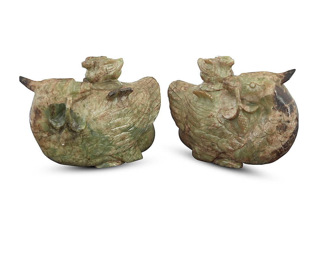 A pair of Chinese carved hardstone ducks: A pair of Chinese carved hardstone ducks Qing Dynasty (1644-1912) or style Each with a baby duck-form lid 2 pieces Each: 5.25" H x 7" W x 3.375" D