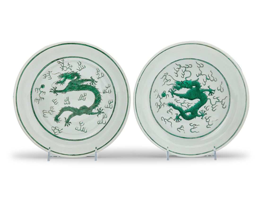 A pair of Chinese green glazed porcelain bowls: A pair of Chinese green glazed porcelain bowls Guangxu Period (1875-1908) or later Each bearing a red reign mark for Daoguang Period (1821-1850) The interiors depicting a single dragon with flaming