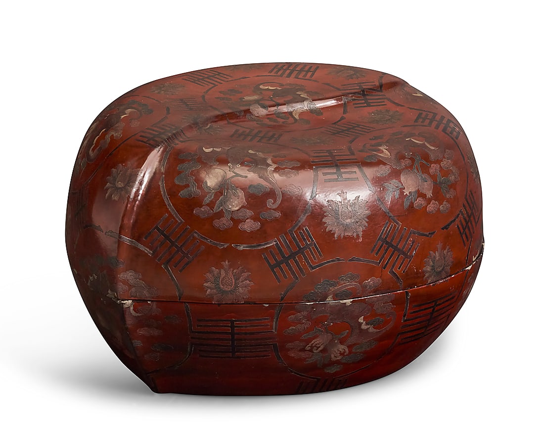 A Rose Tarlow Melrose House chinoiserie red lacquer peach box: A Rose Tarlow Melrose House chinoiserie red lacquer peach box Late 20th century The polychrome lidded box in the form of a peach, incised and painted with bat motifs 12.5" H x 24" W x 18.5" D Provenan