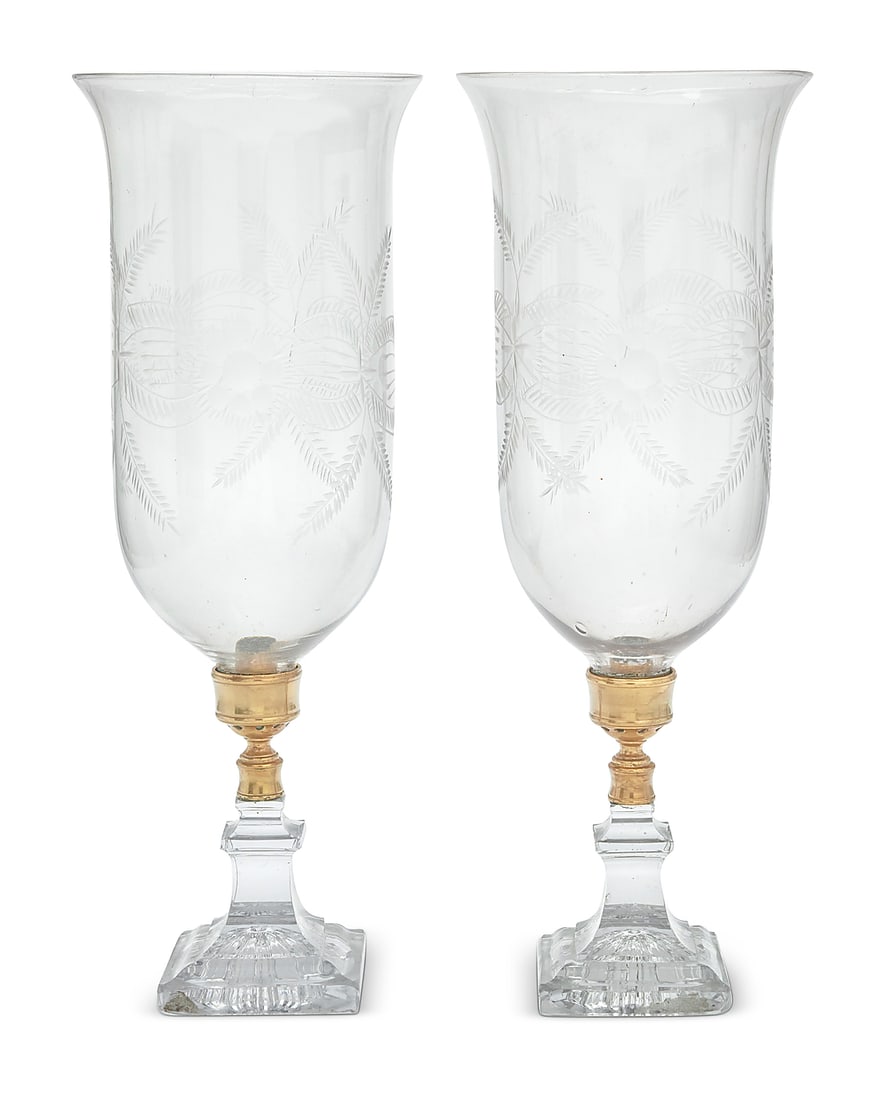 A pair of engraved and molded glass and gilt metal storm candlesticks (1 of 4)