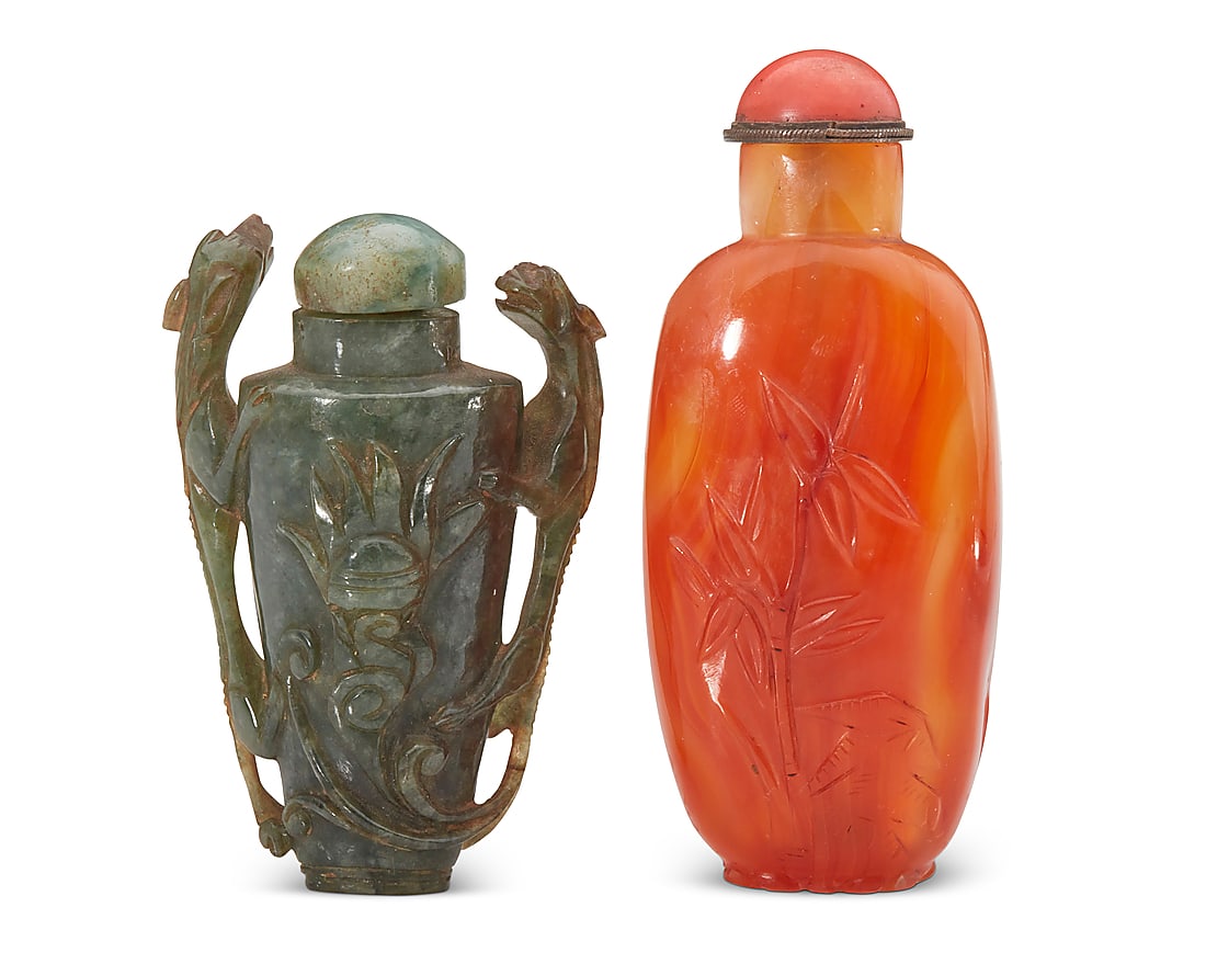 Two Chinese carved hardstone snuff bottles: Two Chinese carved hardstone snuff bottles Qing Dynasty (1644-1912) or later Comprising one spinach jade bottle carved with opposed chilong figures, and a carved hardstone bottle with foliate motifs 2