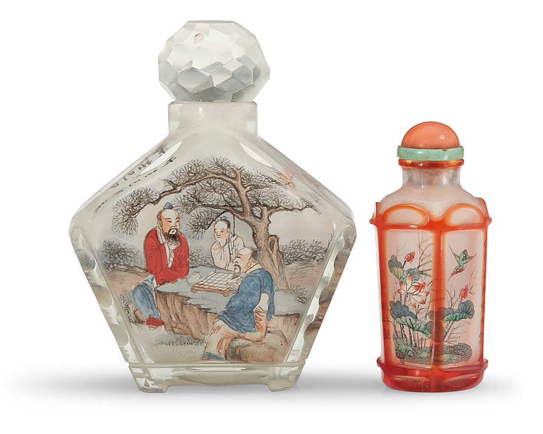 Two Chinese interior painted glass bottles: Two Chinese interior painted glass bottles Early 20th century or later Each painted with poetic inscriptions Comprising one snuff bottle decorated with birds and flowers, and a perfume bottle depictin