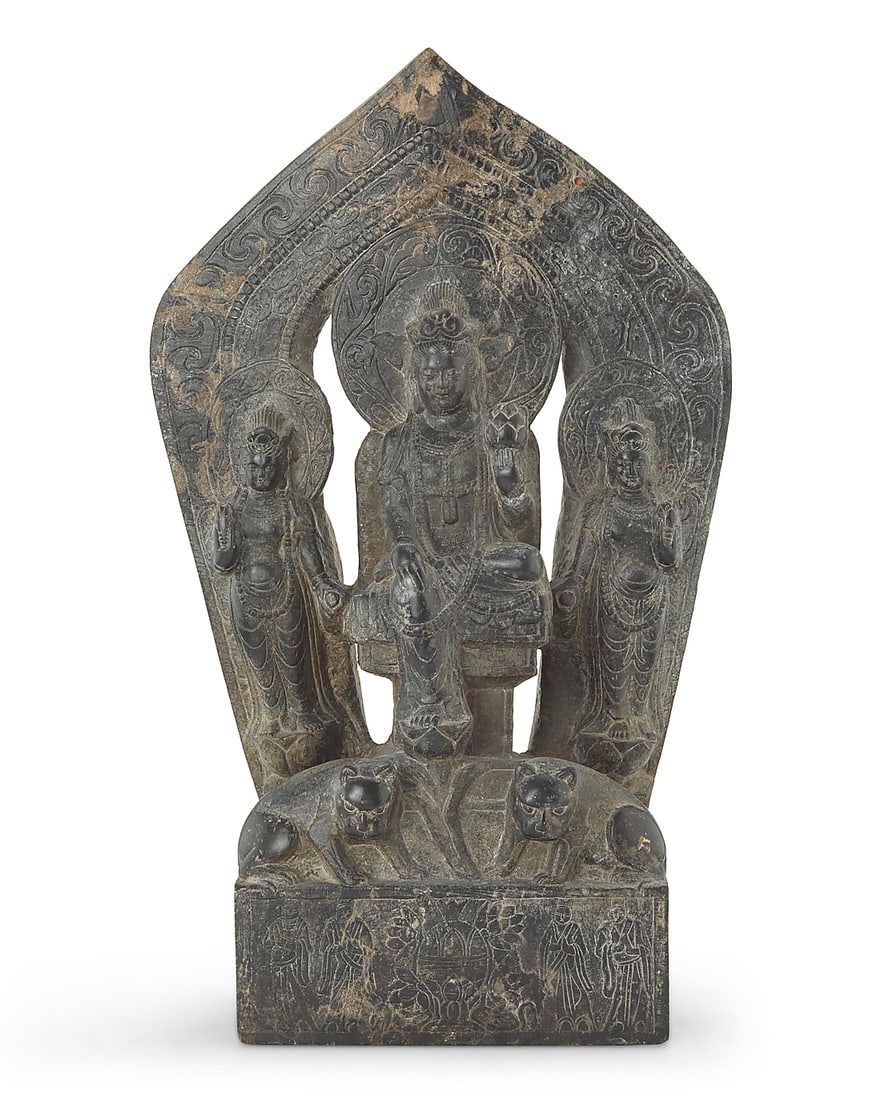 A Chinese Northern Qi style carved stone stele: A Chinese Northern Qi style carved stone stele 20th century or earlier With incised inscription to base verso Depicting three deities and two auspicious beasts recto above an incised figural frieze to