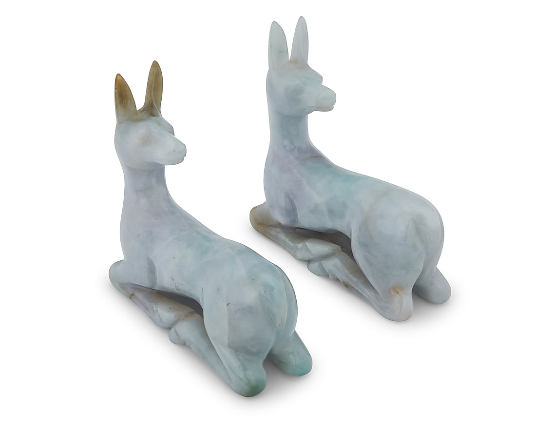 A pair of Chinese carved hardstone recumbent deer: A pair of Chinese carved hardstone recumbent deer 20th century or later 2 pieces Each: 4.5" H x 4.75" W x 1.625" D