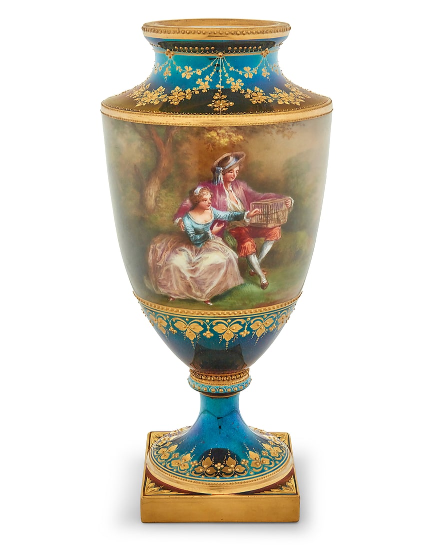 A Vienna style porcelain urn: A Vienna style porcelain urn Early 20th century With overglaze blue beehive mark to underside, and stamped in red: Germany / [crown above cipher]; inscribed: 2547 The body painted with a continuous bu