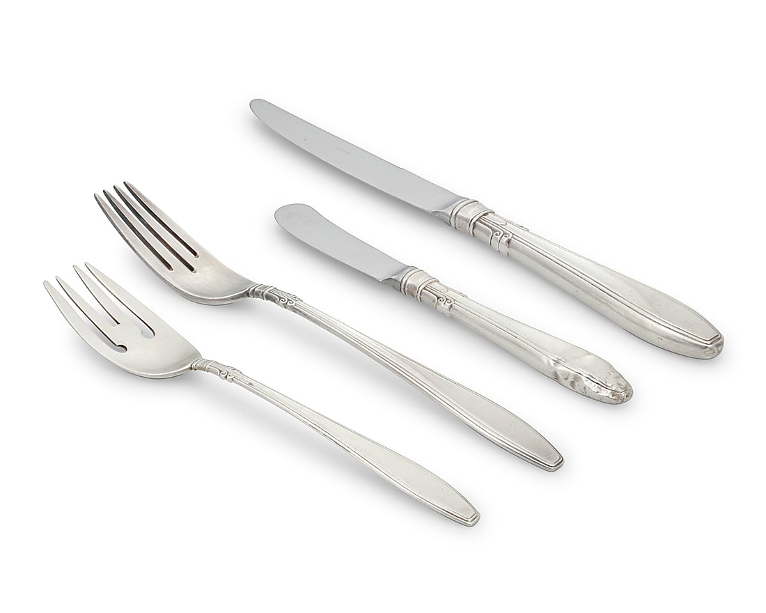A Gorham sterling silver 'Nocturne' part flatware service: A Gorham sterling silver 'Nocturne' part flatware service Late 20th century Designed 1938 Each marked for Gorham and sterling Comprising: 10 dinner knives (9.5") 11 butter spreaders (6.375") 9 dinner 