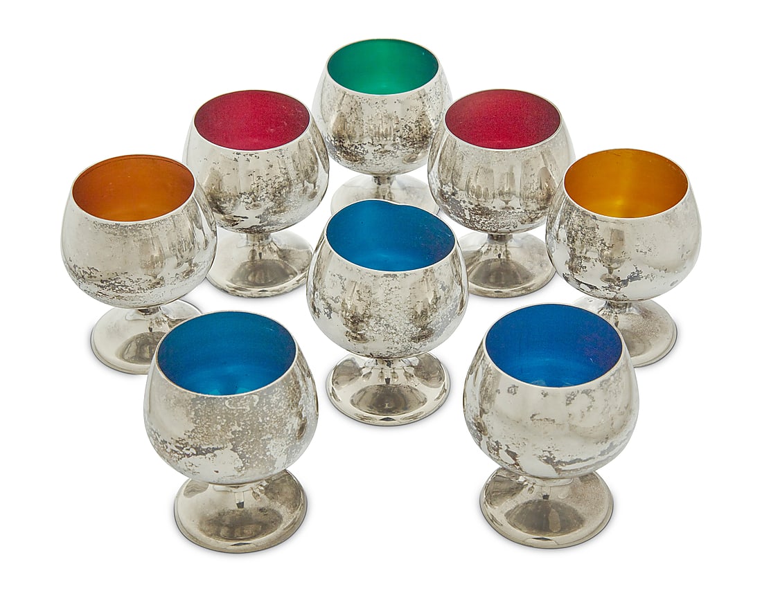 A set of eight Gorham enameled sterling silver cordials: A set of eight Gorham enameled sterling silver cordials Early 20th century Each marked for sterling with factory mark and numbered: 955 Each with enameled interior 8 pieces Each: 1.875" H x 1.625"