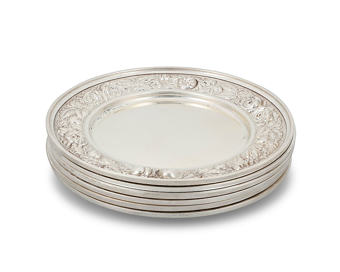 A set of six Stieff sterling silver 'Rose' bread plates: A set of six Stieff sterling silver 'Rose' bread plates Early/mid-20th century Each marked: STIEFF / STERLING / 525 Each with repousse rose motif border 6 pieces Each: 6.25" Dia. Total weight: 22.9
