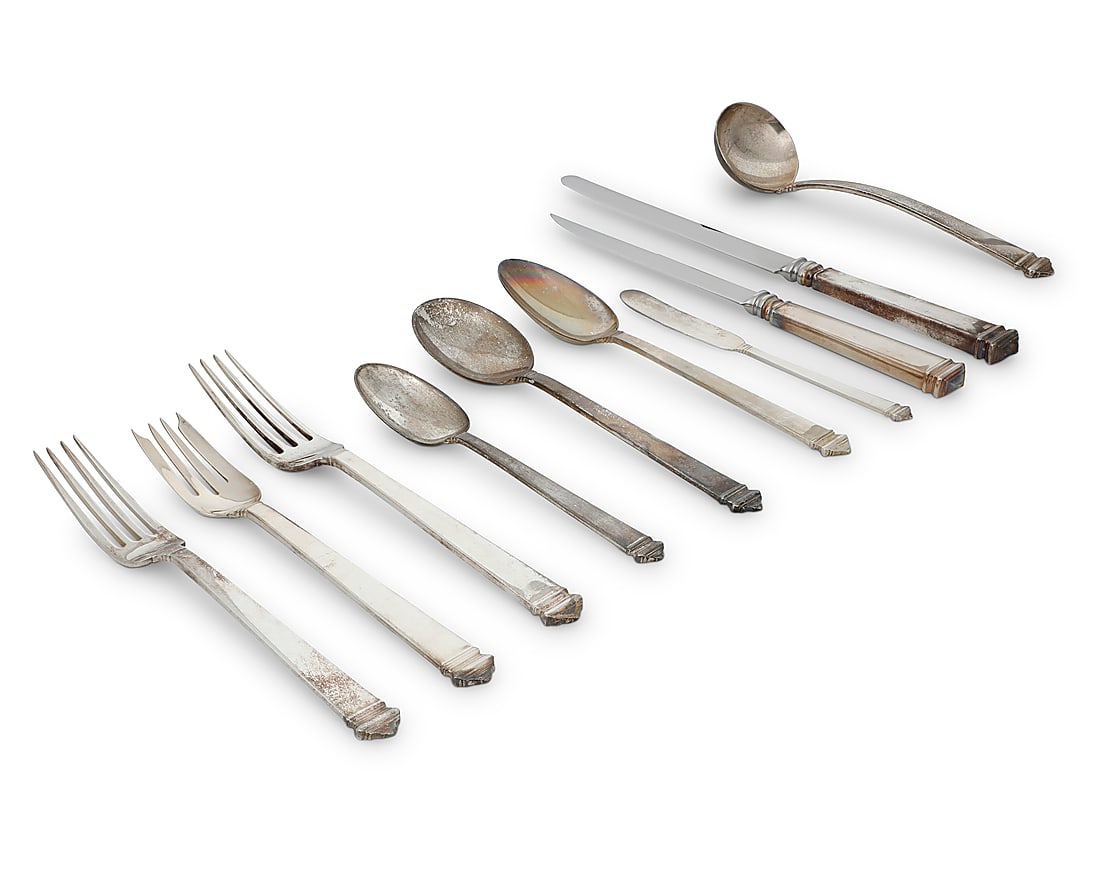 A Tiffany & Co sterling silver 'Hampton' flatware service: A Tiffany & Co sterling silver 'Hampton' flatware service Mid-20th century Designed 1934 Each marked for Tiffany, sterling, and 'M' [directorship of John C. Moore (1907-1947)] Comprising: 4 dinner
