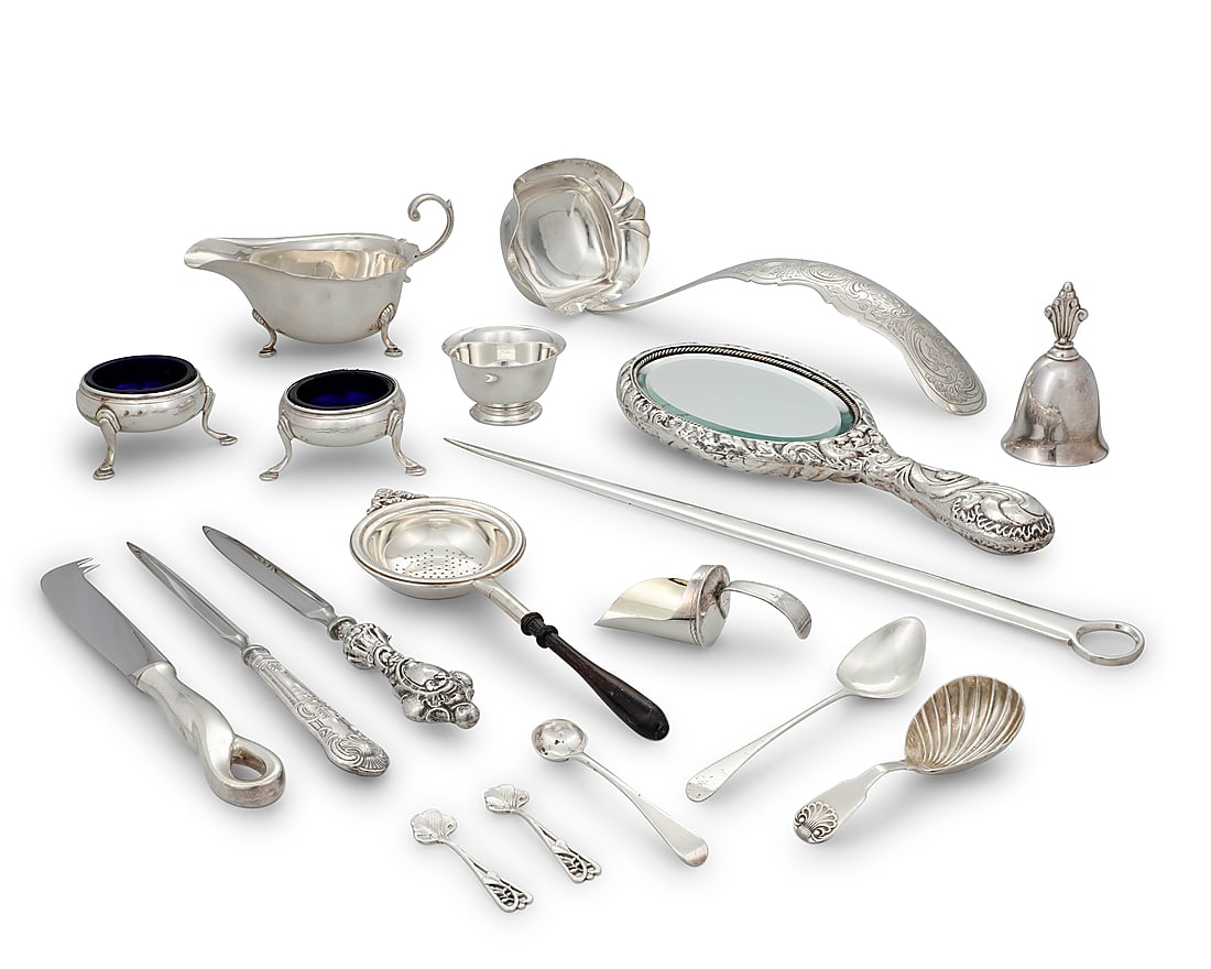 A collection of silver articles: A collection of silver articles Late 19th/20th century Most marked for sterling and maker Comprising an Alvin sauceboat, sugar castor, Tiffany bowl, pair of open salts with cobalt blue glass liners,
