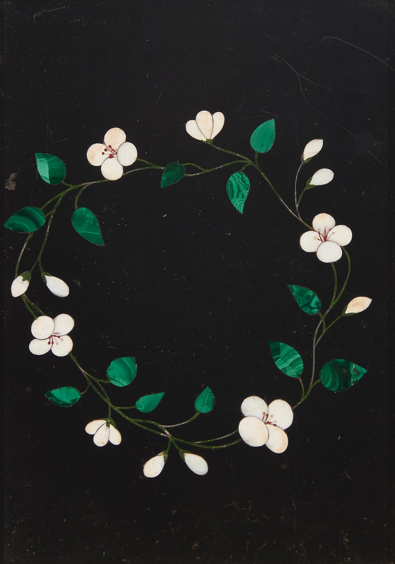 An Italian pietra dura plaque: An Italian pietra dura plaque Early 20th century Depicting a floral wreath Plaque: 5.75" H x 3.875" W