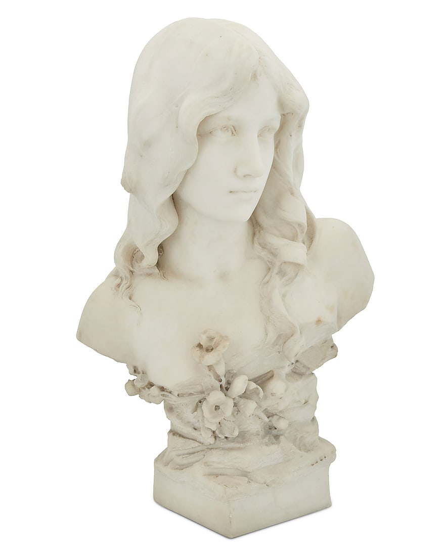 An Italian carved marble bust of a maiden: An Italian carved marble bust of a maiden Early 20th century Unmarked 22.25" H x 12.5" W x 10.5" D Provenance: Private Estate, California