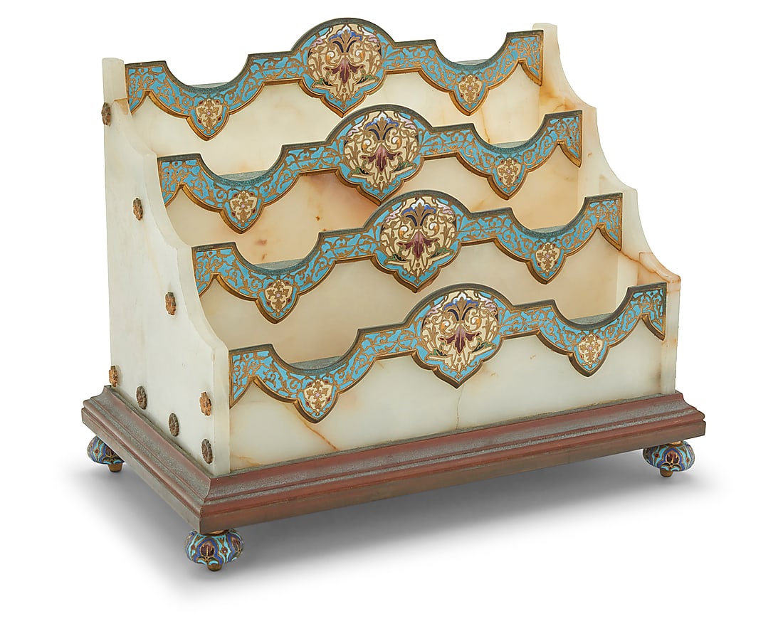 A French champleve and onyx letter rack: A French champleve and onyx letter rack Late 19th/early 20th century Unmarked With enameled floral decorations mounted to onyx, raised on a brass base with champleve feet 9.5" H x 11.5" W x 6.625" D
