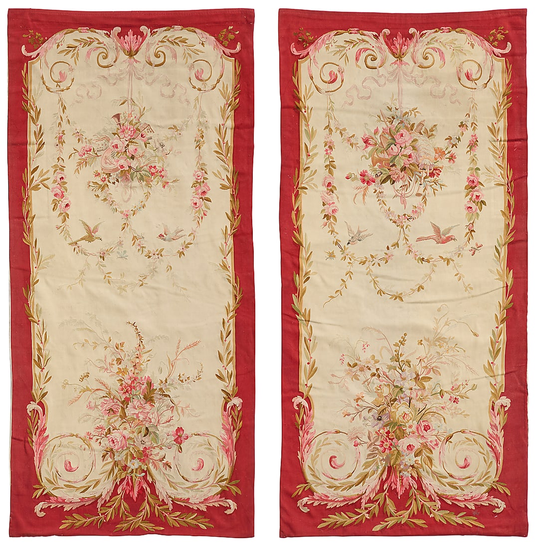 A pair of Aubusson entre-fenetres tapestries: A pair of Aubusson entre-fenetres tapestries Early 20th century Each woven with birds and floral bunches issuing foliate garlands, one with a lute, and one with pipes and a horn 2 pieces Largest: 9' 4