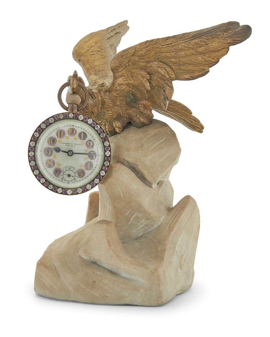 A Continental gilt bronze and marble pocket watch holder: A Continental gilt bronze and marble pocket watch holder Early 20th century Clock dial marked: Camerden & Forster / New York / MADE IN FRANCE Together with a French single-movement clock with cut glas