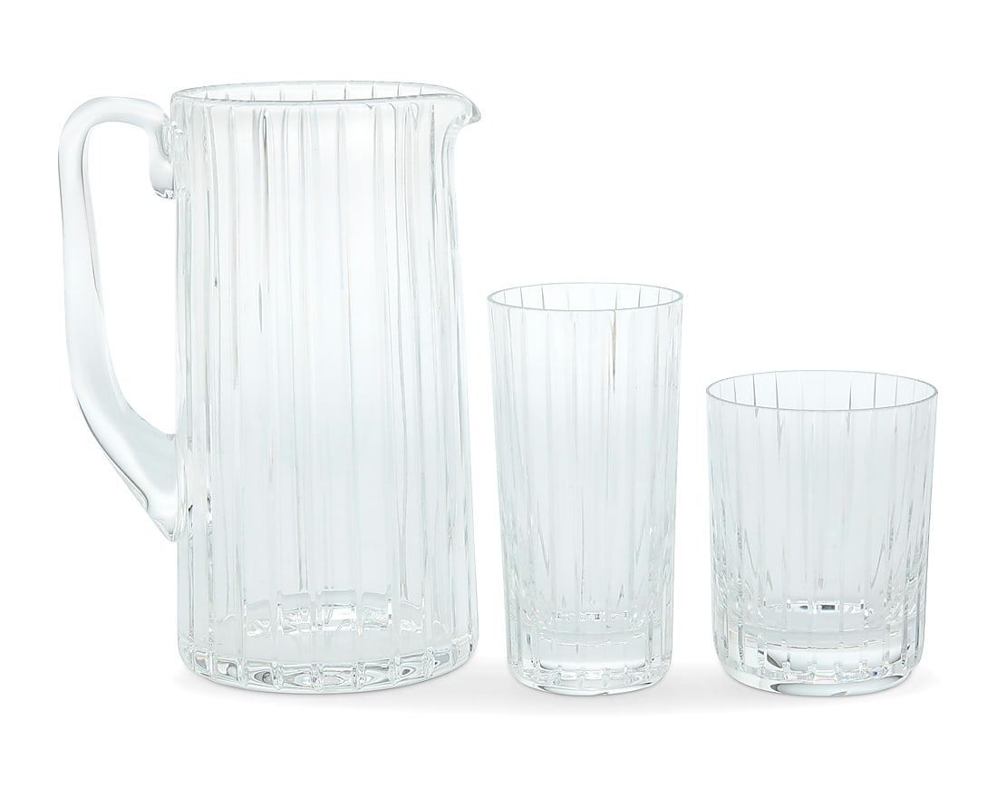 A Baccarat glass 'Harmonie' partial barware set: A Baccarat glass 'Harmonie' partial barware set Late 20th century Each with etched factory mark Each glass housed in original box with foam inserts Comprising: 1 pitcher (8.375") 3 double old fashione