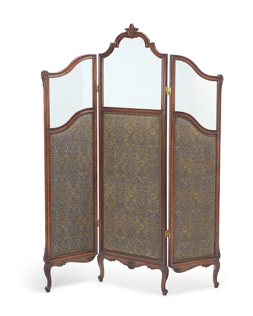 A Louis XV style upholstered walnut three panel screen: A Louis XV style upholstered walnut three panel screen Late 19th/early 20th century With mirrored upper panels above jacquard upholstery with nail head trim Center panel: 72.5" H x 20.5" W x 1.5" D;