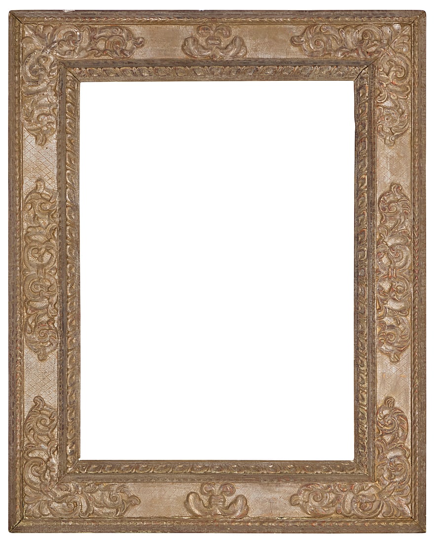 A carved silvered wood frame: A carved silvered wood frame With egg and dart trim and foliate motifs in relief Inner: 33.5" H x 24.5" W; Outer: 45.625" H x 36.375" W x 2.75" D Provenance: Private Estate, California