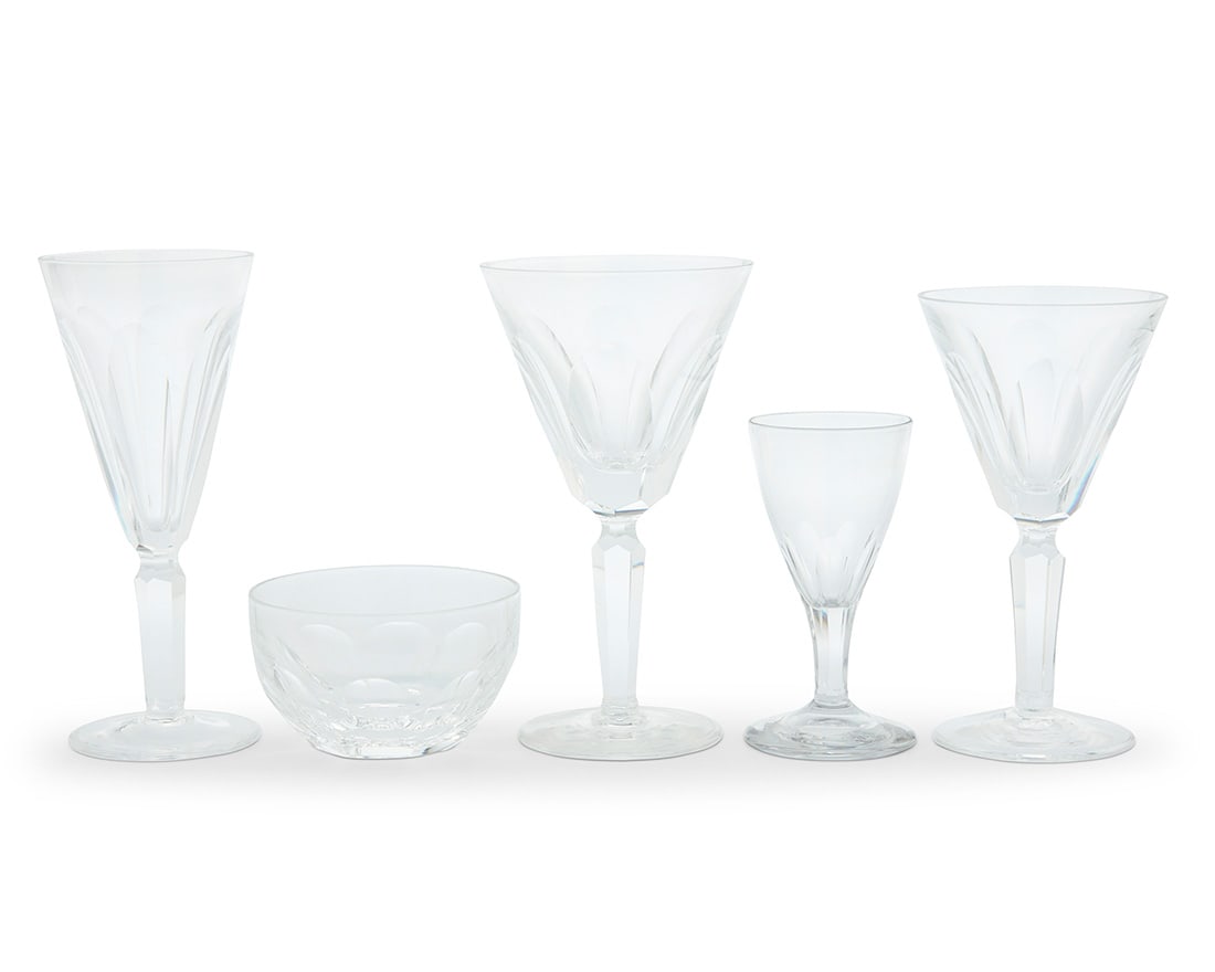 A Waterford cut glass 'Sheila' part stemware service: A Waterford cut glass 'Sheila' part stemware service Late 20th century Designed 1958 Each etched with factory mark Comprising: 11 water goblets (7") 11 claret wine glasses (6.5") 27 fluted champagne g