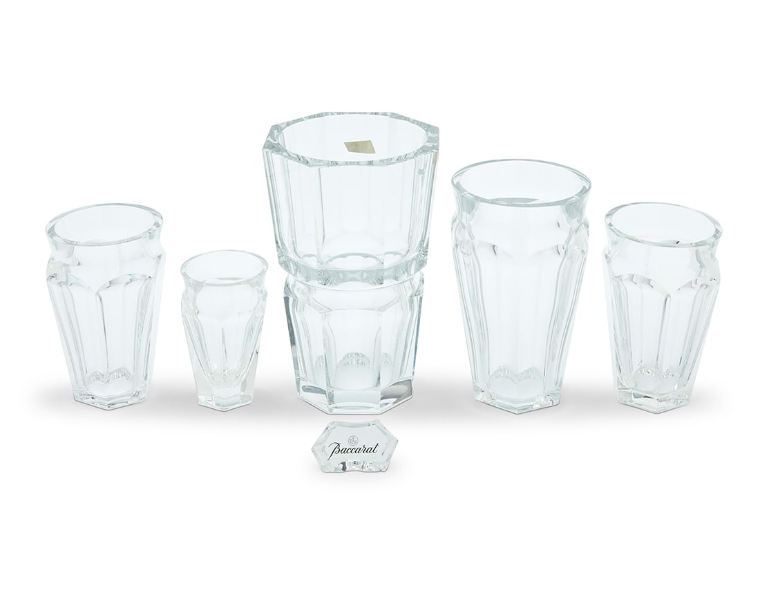 A group of five Baccarat glass 'Edith' and 'Nelly' vases: A group of five Baccarat glass 'Edith' and 'Nelly' vases Late 20th century Each with etched factory mark Comprising one 'Edith' vase housed in original box, and four 'Nelly' vases in graduated sizes, 