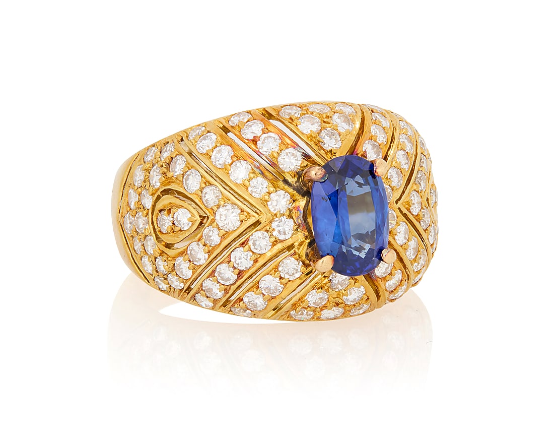 An 18K Gold, Sapphire and Diamond Ring - 3