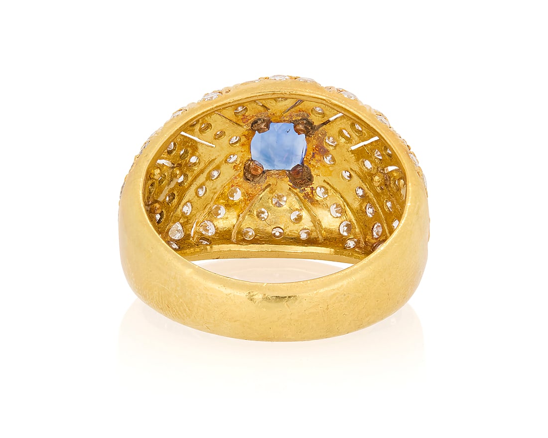 An 18K Gold, Sapphire and Diamond Ring - 4