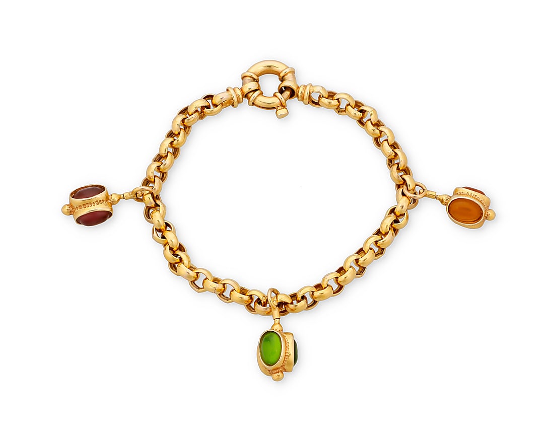 A 14K Gold and Gem-Set Bracelet: A 14K Gold and Gem-Set Bracelet Of an open link design suspending three charms set with oval amethyst, citrine and peridot, signed Italy with Italian workshop marks Length: 7 1/2 in. 17.0 grams gross