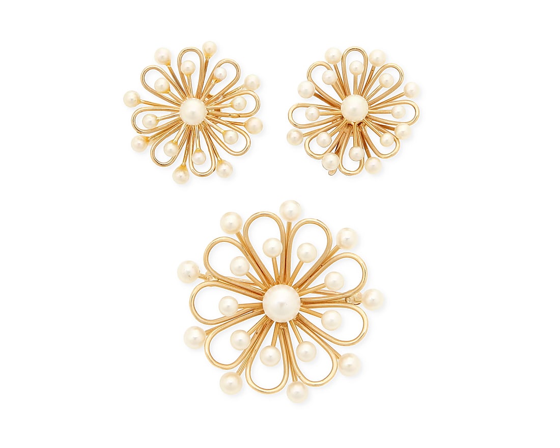 A 14K Gold and Cultured Pearl Brooch and Earring Set: A 14K Gold and Cultured Pearl Brooch and Earring Set Including a brooch and pair of earrings all of a floral openwork design accented by cultured pearls, with maker's marks 3 pieces Brooch: 1 1/2