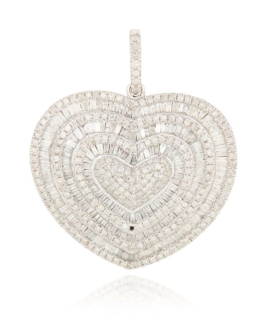 A 14K White Gold and Diamond Pendant: A 14K White Gold and Diamond Pendant Of a heart-shaped design, featuring multiple rows of round and tapered baguette diamonds weighing approximately 5.75 carats Measures: 1 1/2 x 1 1/2 in. 14.4 grams