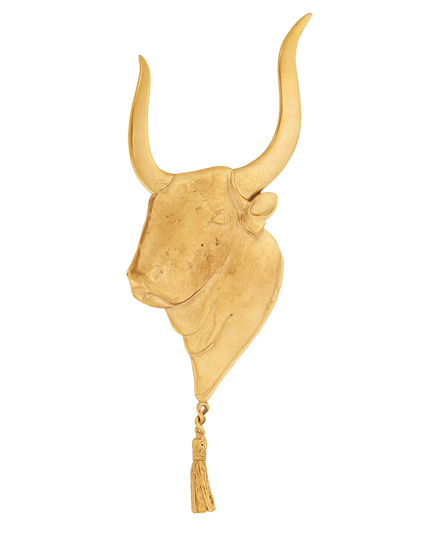 A Brass Bull Brooch: A Brass Bull Brooch Of a long horn bull design suspending a tassel, signed GW + ST Measures: 6 1/2 x 3 in. 48.2 grams gross This lot is being offered with no reserve