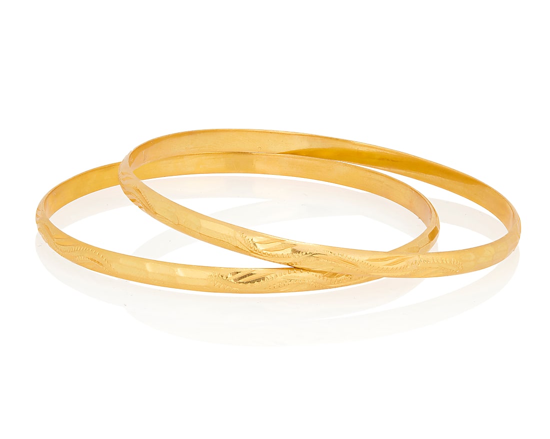 A Pair of 22K Gold Bangles (1 of 2)
