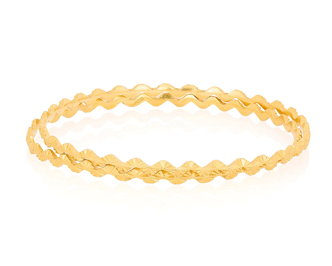 A Pair of 22K Gold Bangles (1 of 2)