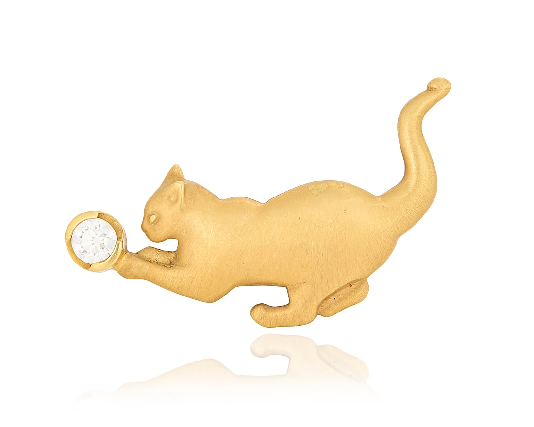 Gallen Benson: An 18K Gold and Diamond Brooch: Gallen Benson: An 18K Gold and Diamond Brooch Of a cat design with a satin finish playing with a singular round diamond weighing approximately 0.40 carat, signed Gallen Benson Measures: 1 1/2 x 1 in. 