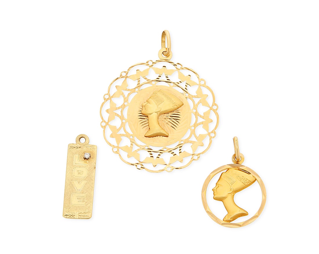A Group of Three 18K Gold Pendants: A Group of Three 18K Gold Pendants Including two Nefertiti pendants together with a plaque engraved 'Love and Carol' 3 pieces Measures: 1 1/4 - 2 in. 18.0 grams gross