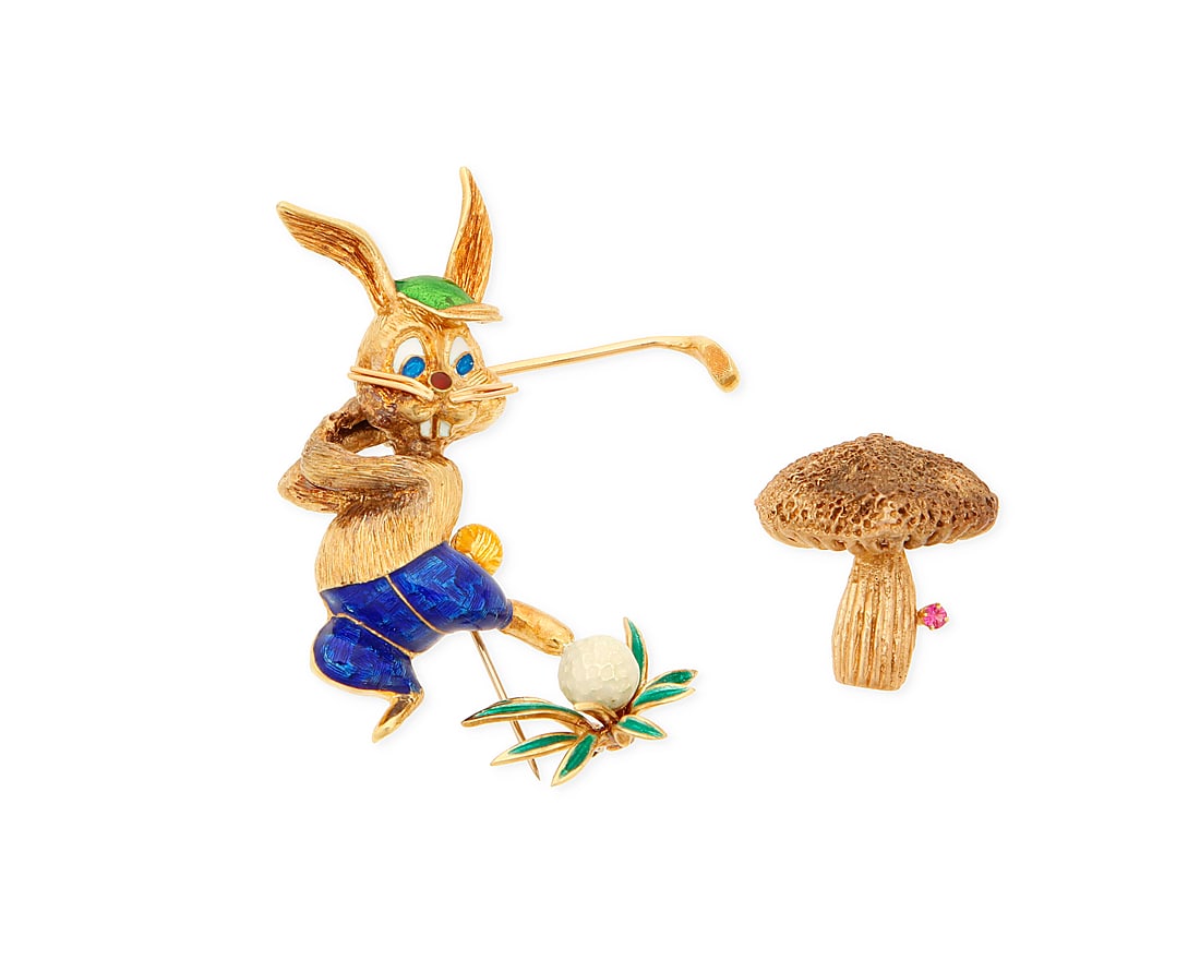 Two 14K Gold Brooches: Two 14K Gold Brooches including one of a golfing bunny design accented by red, blue and green enamel together with a mushroom design accented by a single round ruby 2 pieces Measures: 1 x 1 in. and 2 