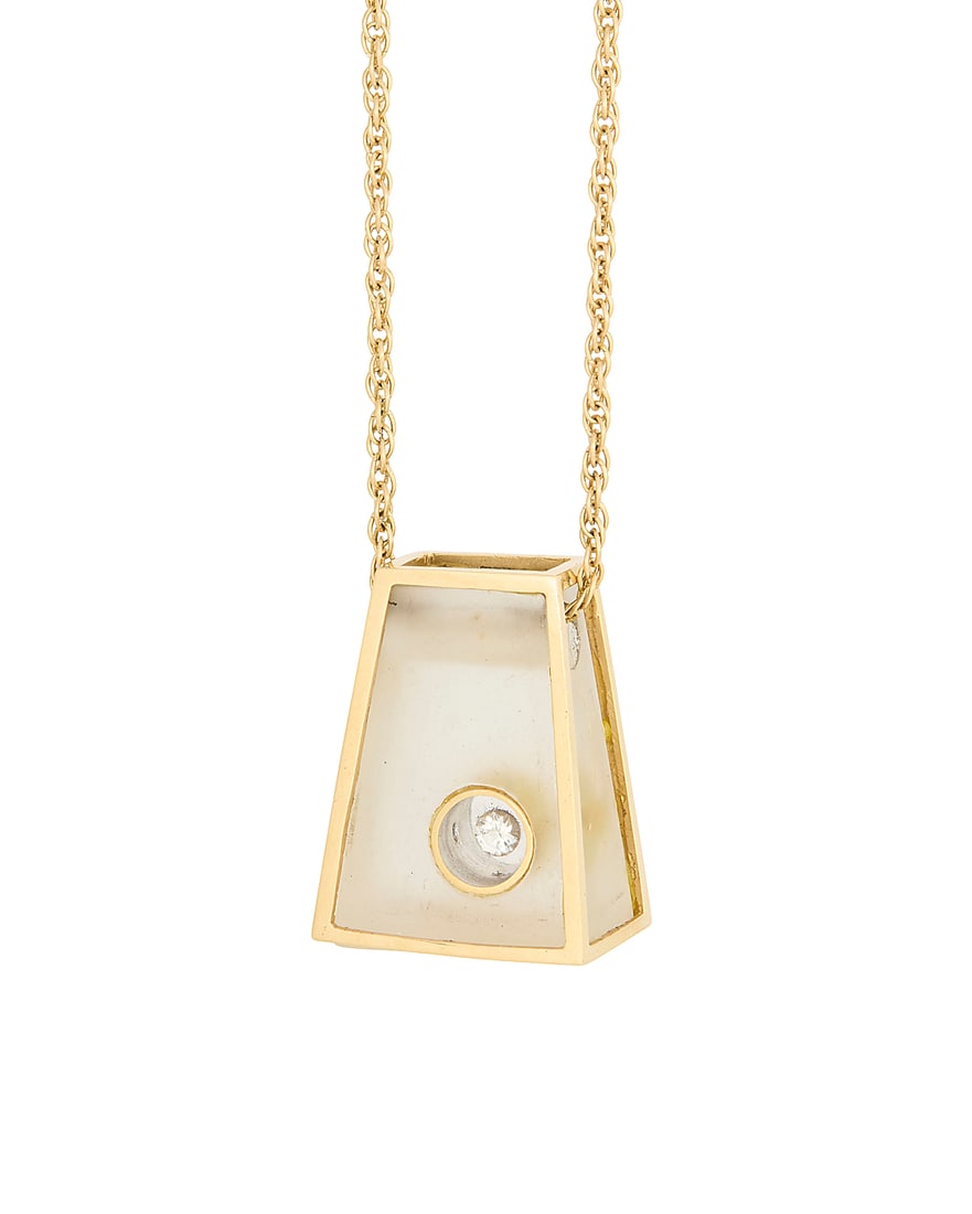 A 14K Gold and Diamond Pendant Necklace: A 14K Gold and Diamond Pendant Necklace Featuring a fancy link chain suspending a geometric resin pendant accented by a single round diamond Chain: 16 in., Pendant: 1 x 3/4 in. 11.3 grams gross This