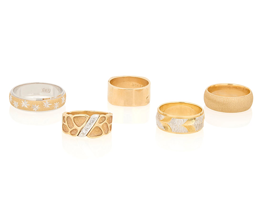A Group of Five 14K Bi-Color Gold Rings: A Group of Five 14K Bi-Color Gold Rings Featuring high polish, textured gold and celestial designs Sizes: 6 - 11 31.5 grams gross