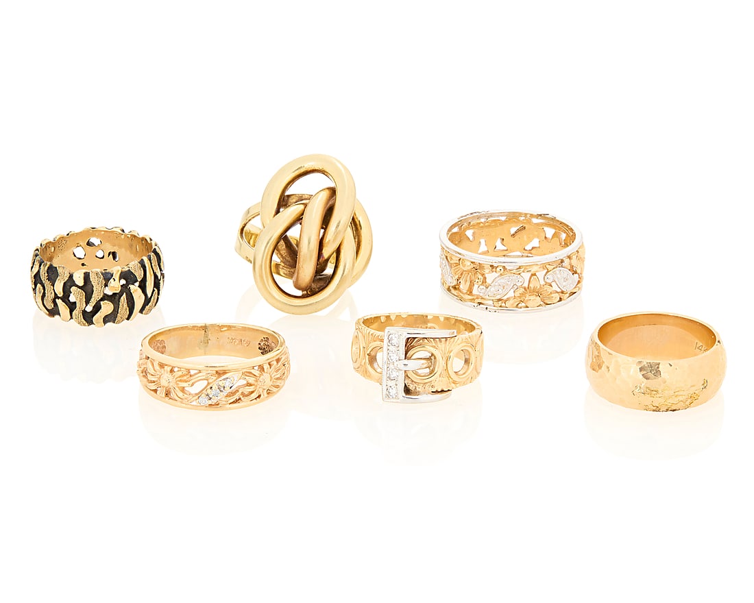 A Group of Six 14K Gold Rings: A Group of Six 14K Gold Rings Featuring floral, buckle and organic designs 6 pieces Size: 6 1/2 - 10 1/2 46.0 grams gross