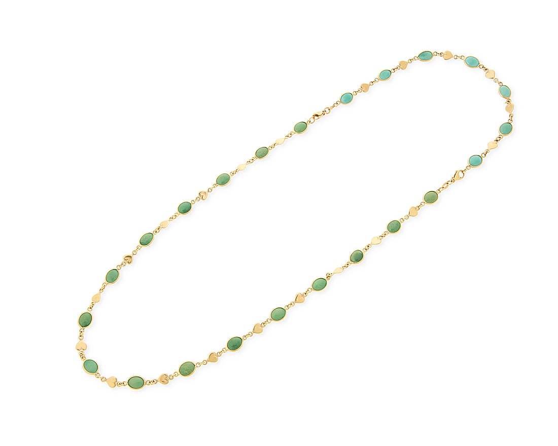 A 14K Gold and Turquoise Necklace: A 14K Gold and Turquoise Necklace Of a stationed design featuring heart-shaped links and oval turquoise cabochons Length: 23 in. 17.7 grams gross