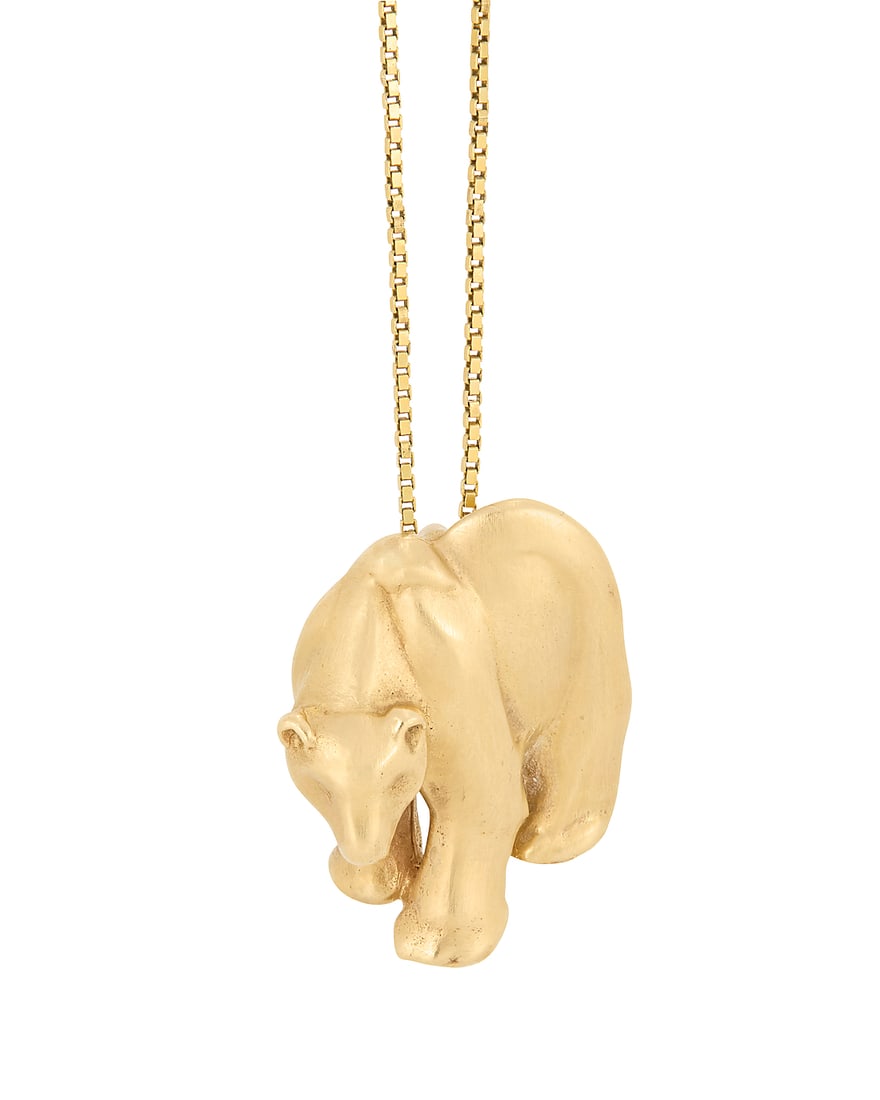 A 14K Gold Pendant Necklace: A 14K Gold Pendant Necklace Featuring a 14k gold box chain suspending a satin polished bear pendant Chain: 23 in., Pendant: 1 x 3/4 in. 9.1 grams gross
