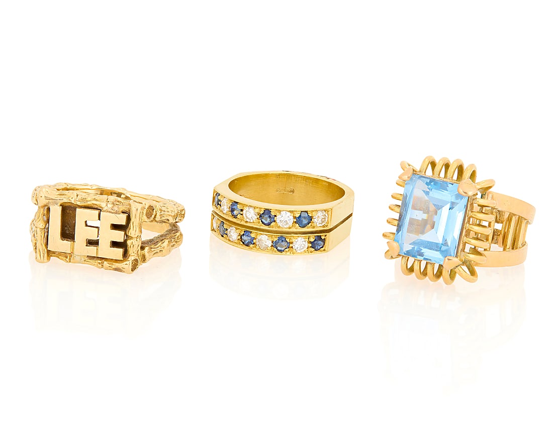 A Group of Three 18K Gold Rings: A Group of Three 18K Gold Rings Including a double diamond and sapphire set ring, one featuring the name of 'Lee' and one centering a synthetic blue spinel 3 pieces Sizes: 7 1/4, 7 1/2, 5 1/2 30.7
