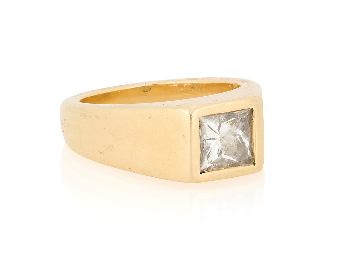A 14K Gold and Diamond Ring: A 14K Gold and Diamond Ring Centering a princess-cut diamond weighing approximately 0.90 carat Size: 6 10.3 grams gross