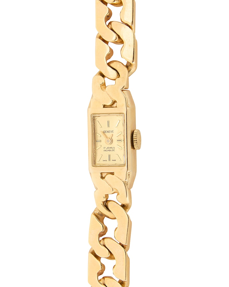 Geneve: A 14K Gold Watch: Geneve: A 14K Gold Watch Dial: 7.5mm, rectangular with baton hour markers Case: 10.80 mm Closure: gold Cuban link bracelet Signed: dial Inner circumference: 6 3/4 in. 41.7 grams gross