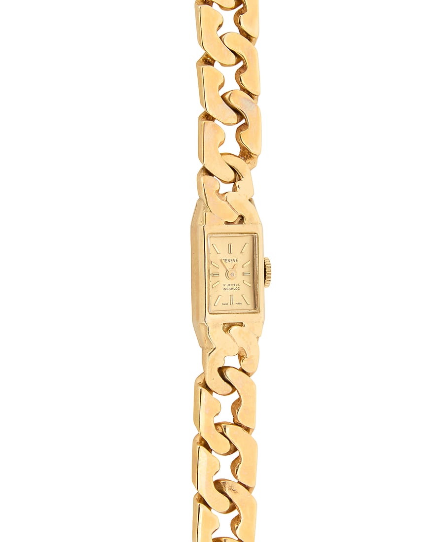 Geneve: A 14K Gold Watch: Geneve: A 14K Gold Watch Dial: 7.5 mm, rectangular with baton hour markers Case: 10.80 mm Closure: gold Cuban link bracelet Signed: dial Inner circumference: 6 3/4 in. 41.6 grams gross