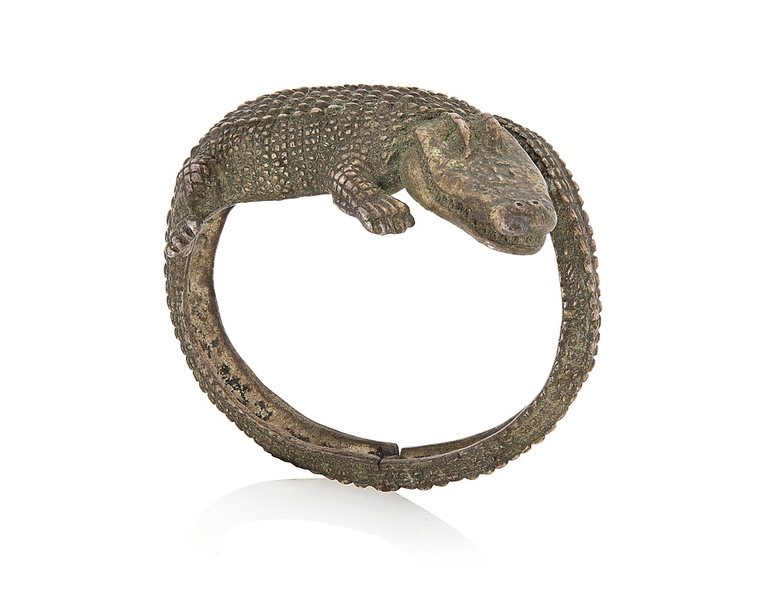 Michael Ozag: A Sterling Silver 'Zyde Gator' Alligator Bracelet: Michael Ozag: A Sterling Silver 'Zyde Gator' Alligator Bracelet The oval cuff with hinged tail clasp, marked for maker and for sterling 6 1/4 in. inner C x 1 3/4 in. W 78.6 grams
