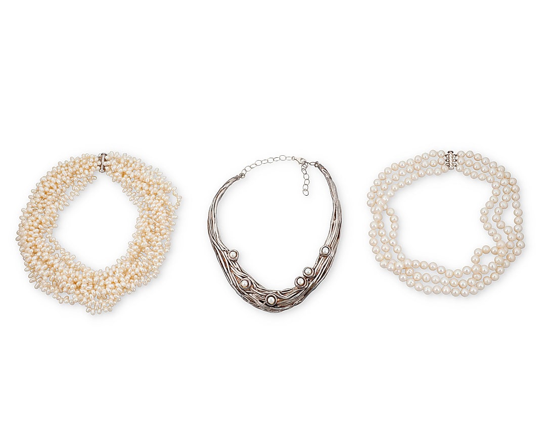 A Group of Three Sterling Silver and Cultured Pearl Necklaces: A Group of Three Sterling Silver and Cultured Pearl Necklaces Including two featuring multi-strands of cultured pearls finished with simple silver clasps together with a hallow silver organic style
