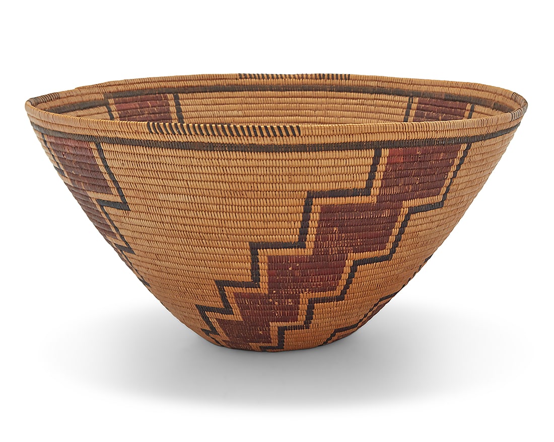 A Panamint Shoshone polychrome basket: A Panamint Shoshone polychrome basket Early 20th century; Great Basin The coiled basket with three-rod foundation, with partial rim ticking above five radiating stepped arms issuing from center 6.25" 